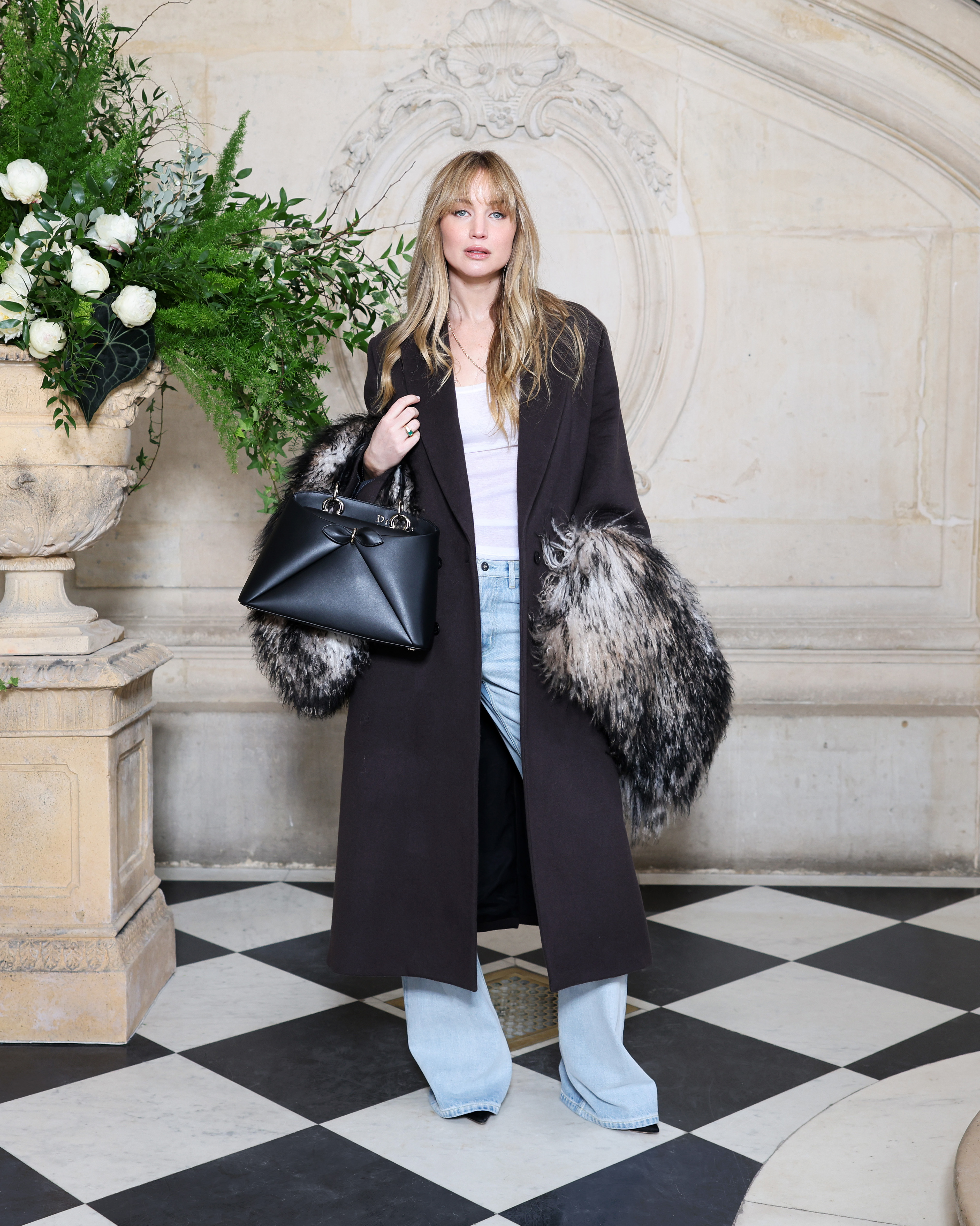 Jennifer Lawrence attended the Dior Couture show in wide-leg jeans