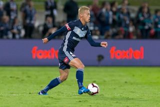 Keisuke Honda in action for Melbourne Victory against Sydney FC in May 2019.