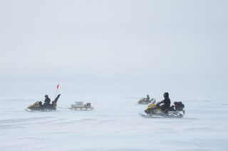 Skidoos in V-Shaped Formation in Antarctica