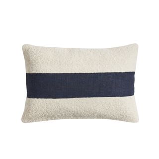 White rectangular throw pillow with blue stripe
