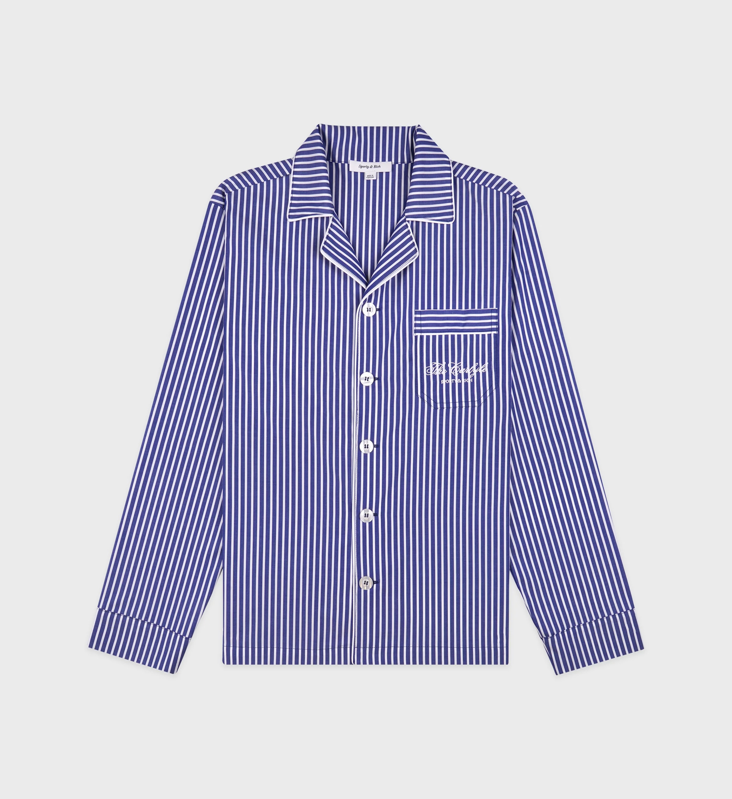 https://sportyandrich.com/collections/sporty-rich-x-the-carlyle/products/the-carlyle-script-pyjama-top-navy-white-white