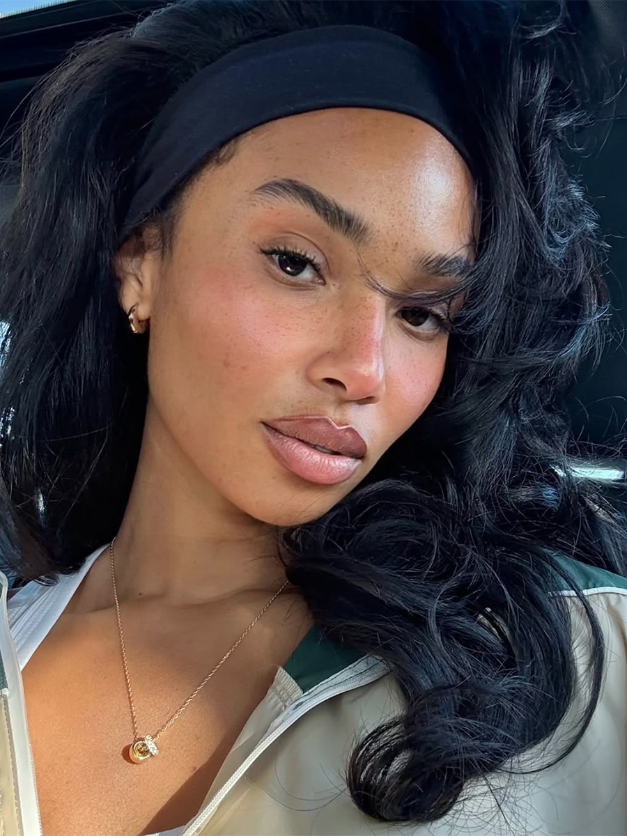 Symphani Soto with glowy skin and windswept tresses