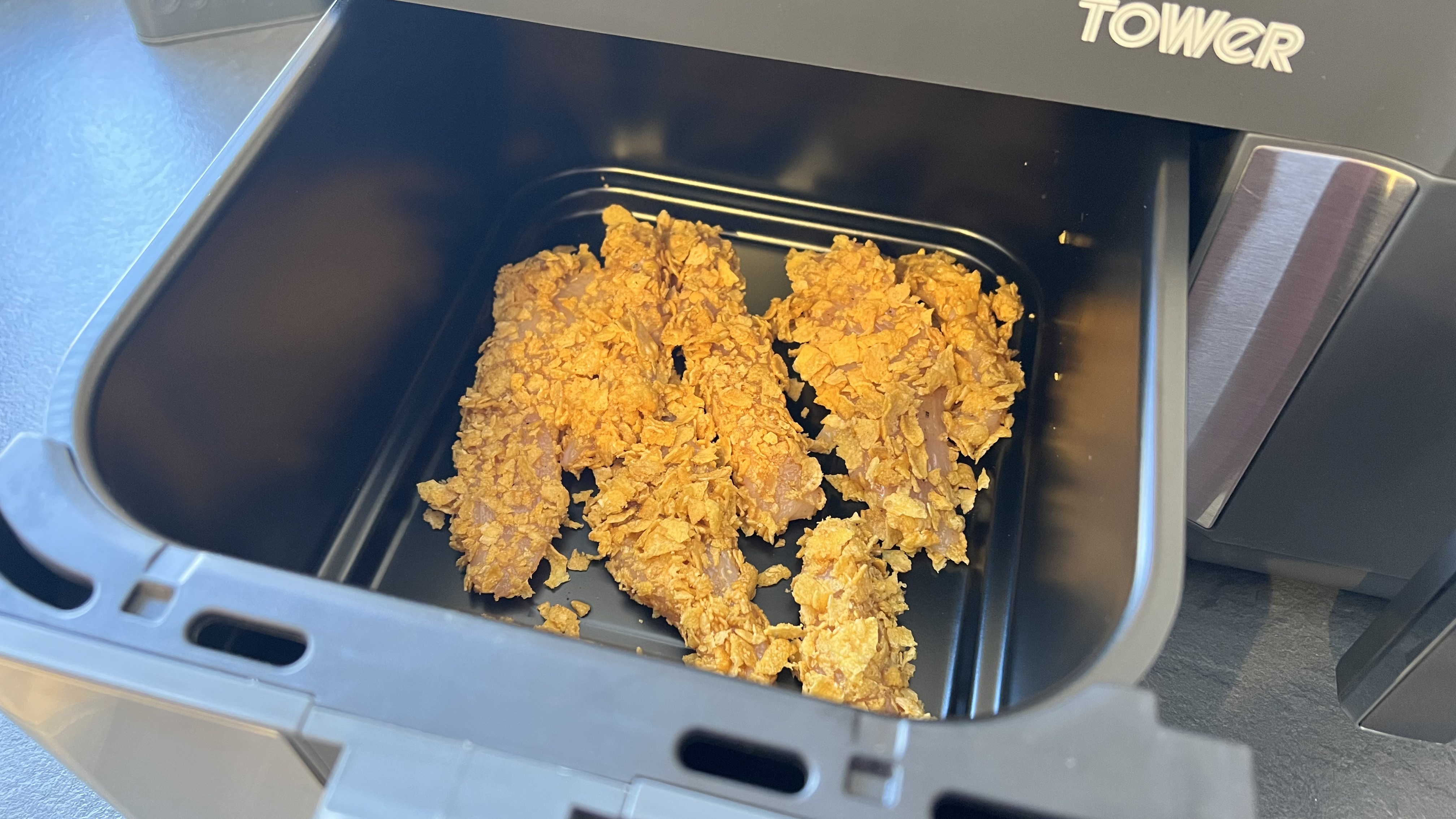 Honey-garlic chicken tenders in a Tower air fryer