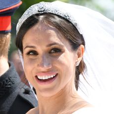 Meghan, Duchess of Sussex leaves Windsor Castle in the Ascot Landau carriage during a procession after getting married at St Georges Chapel on May 19, 2018 in Windsor, England. Prince Henry Charles Albert David of Wales marries Ms. Meghan Markle in a service at St George's Chapel inside the grounds of Windsor Castle. Among the guests were 2200 members of the public, the royal family and Ms. Markle's mother, Doria Ragland. 