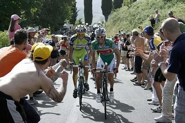 Stefano Garzelli (Acqua &amp; Sapone) leads Ivan Basso (Liquigas) up a climb.