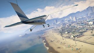 A plane flies over the beach and sea in Grand Theft Auto V
