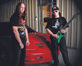 Steve Tucker (left) and Trey Azagthoth; Azagthoth is holding his Nineties Ibanez Universe 7-String