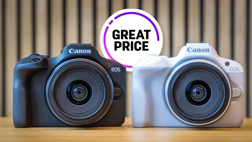 Black and white Canon EOS R50 bodies, in front of a striped background, with the text balloon &quot;Great Price&quot;