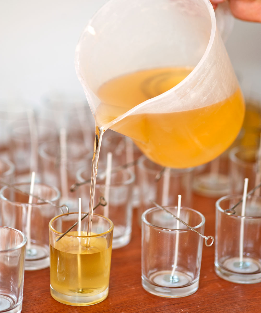 candle liquid with mug glass and niddle