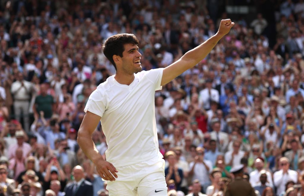 Carlos Alcaraz of Spain celebrates winning Championship point against Novak Djokovic of Serbia in the Gentlemen&#039;s Singles Final during day fourteen of The Championships Wimbledon 2024 at All England Lawn Tennis and Croquet Club on July 14, 2024 in London, England