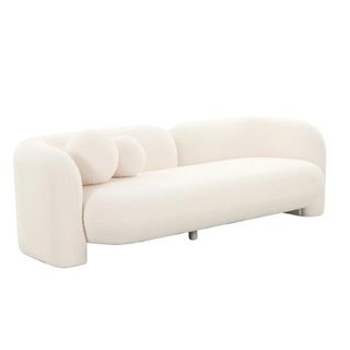 A cream colored minimalist sofa