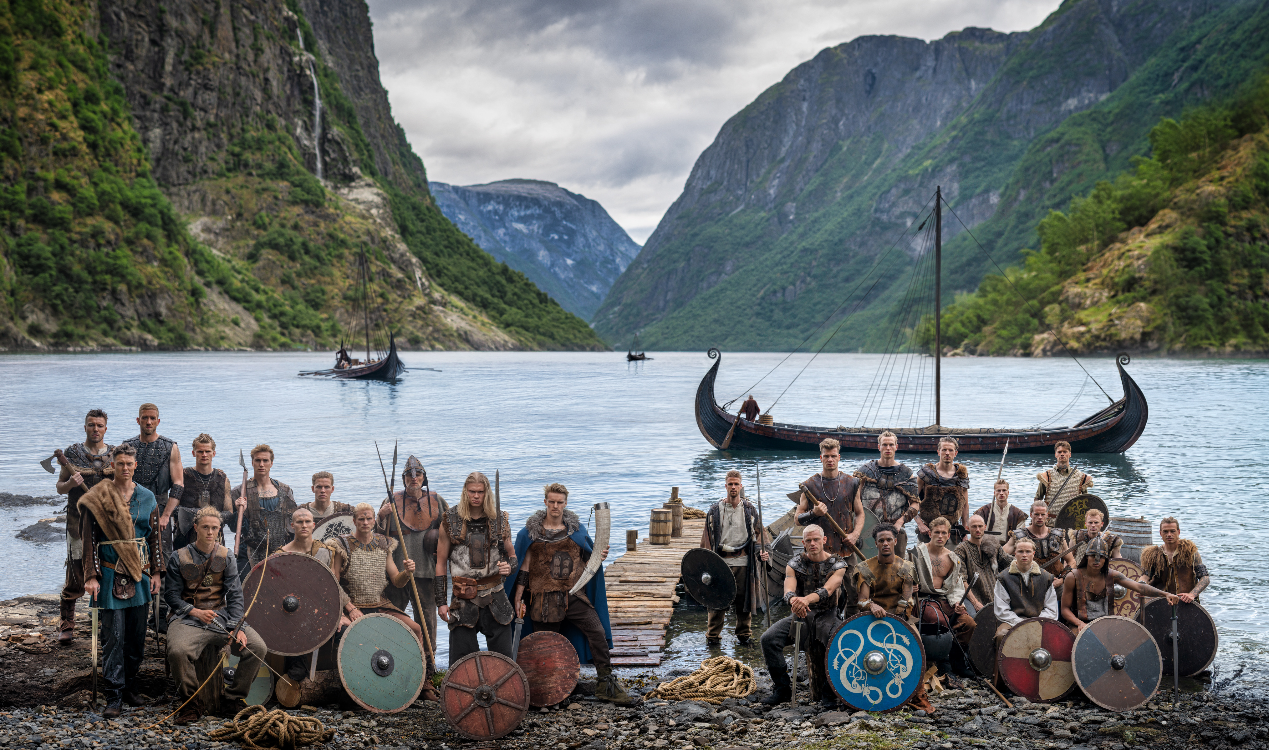 The Norway FIFA team poses as vikings on a rocky beach