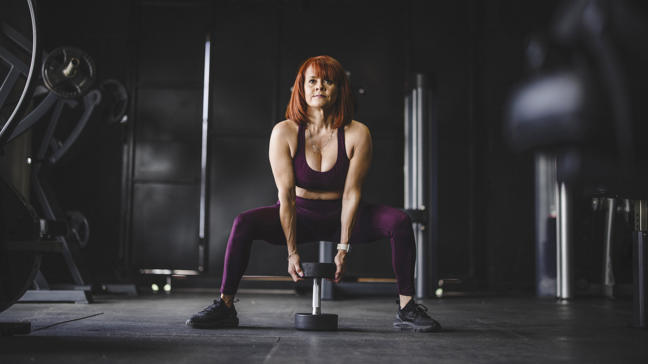 Woman exercising with dumbbell