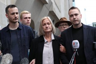 Sally Challen, flanked by her sons James (left) and David (right)