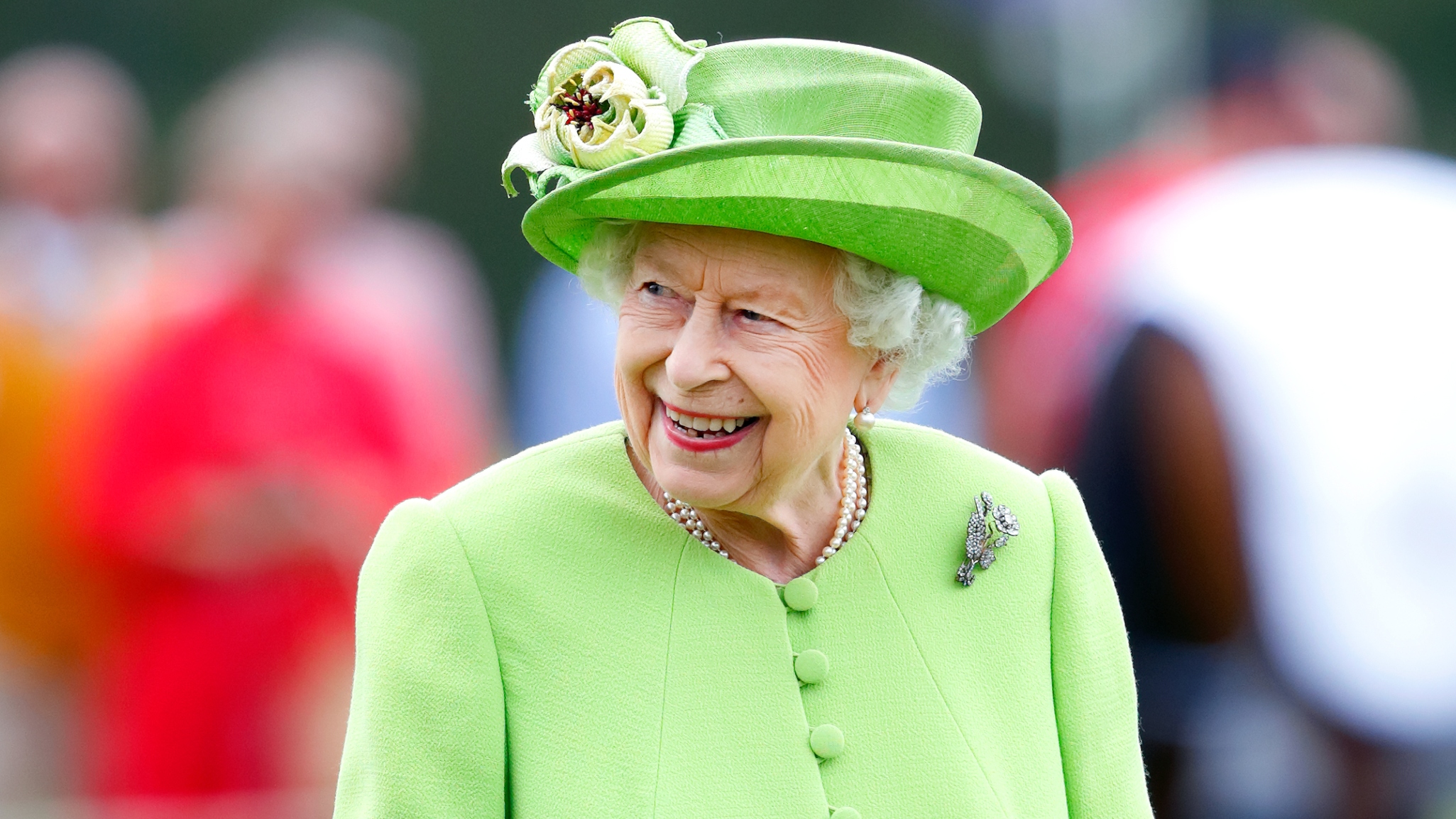 Queen Elizabeth II attends the Out-Sourcing Inc. Royal Windsor Cup polo match at Guards Polo Club, Smith's Lawn on July 11, 2021