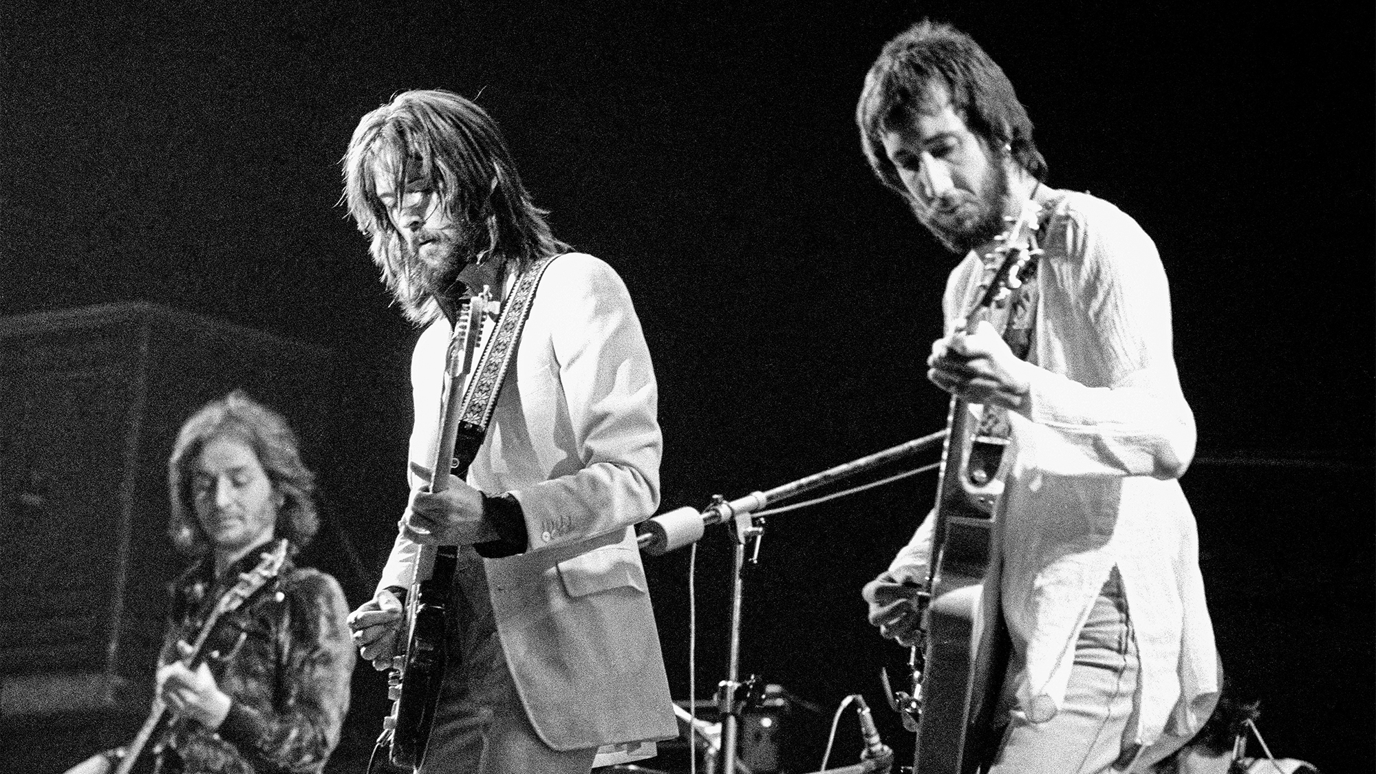 (from left) Ric Grech, Eric Clapton adn Pete Townshend perform at the Rainbow Theatre in London, January 13, 1973