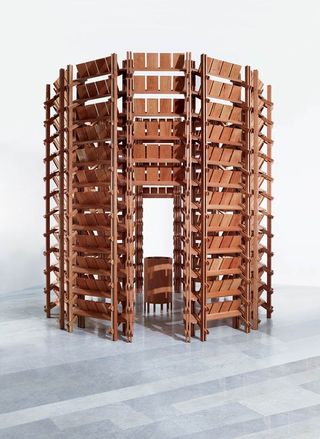 A dramatic circular tower of shelves.