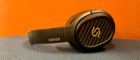 Edifier Stax Spirit S3 headphones on orange/gray background