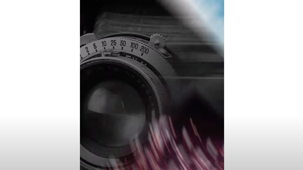 A screenshot of the Fujifilm X Summit teaser showing a vintage camera lens