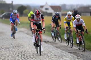 WAREGEM BELGIUM MARCH 30 Tadej Pogacar of Slovenia and UAE Team Emirates competes during the 76th Dwars Door Vlaanderen 2022 Mens Elite a 1837km one day race from Roeselare to Waregem DDV22 DDVmen WorldTour on March 30 2022 in Waregem Belgium Photo by Tim de WaeleGetty Images