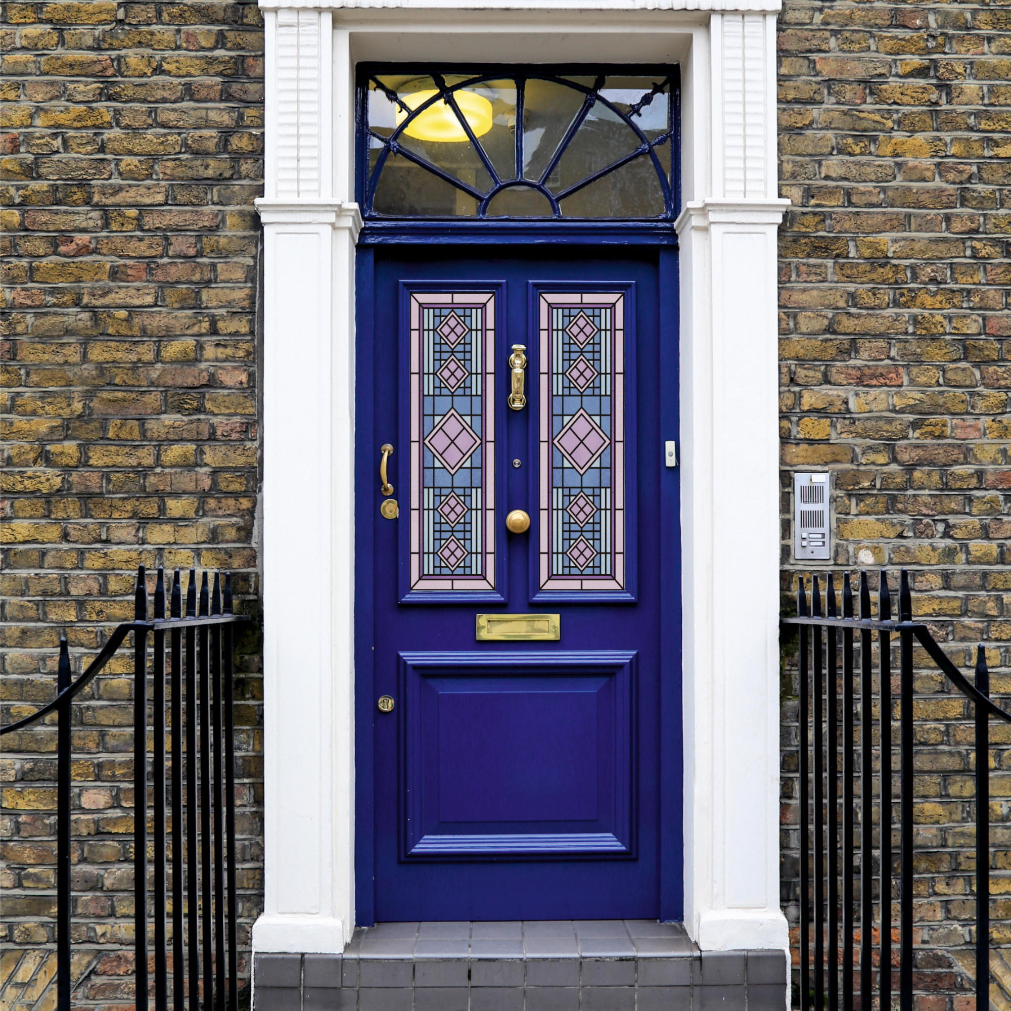 Bright blue front door with window film stained glass, brass door furniture