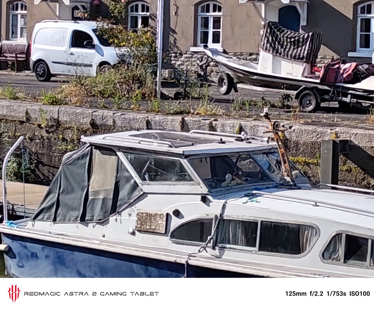 Photos of a boat and a man taken on the RedMagic Astra 2