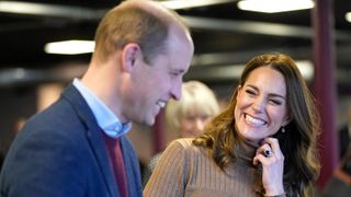 Prince William and Kate Middleton seen laughing together during a visit to the Church on the Street on on January 20th, 2022 in Burnley, England.