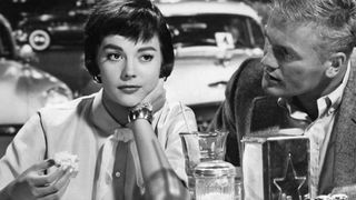 Natalie Wood eats in a diner in The Girl He Left Behind