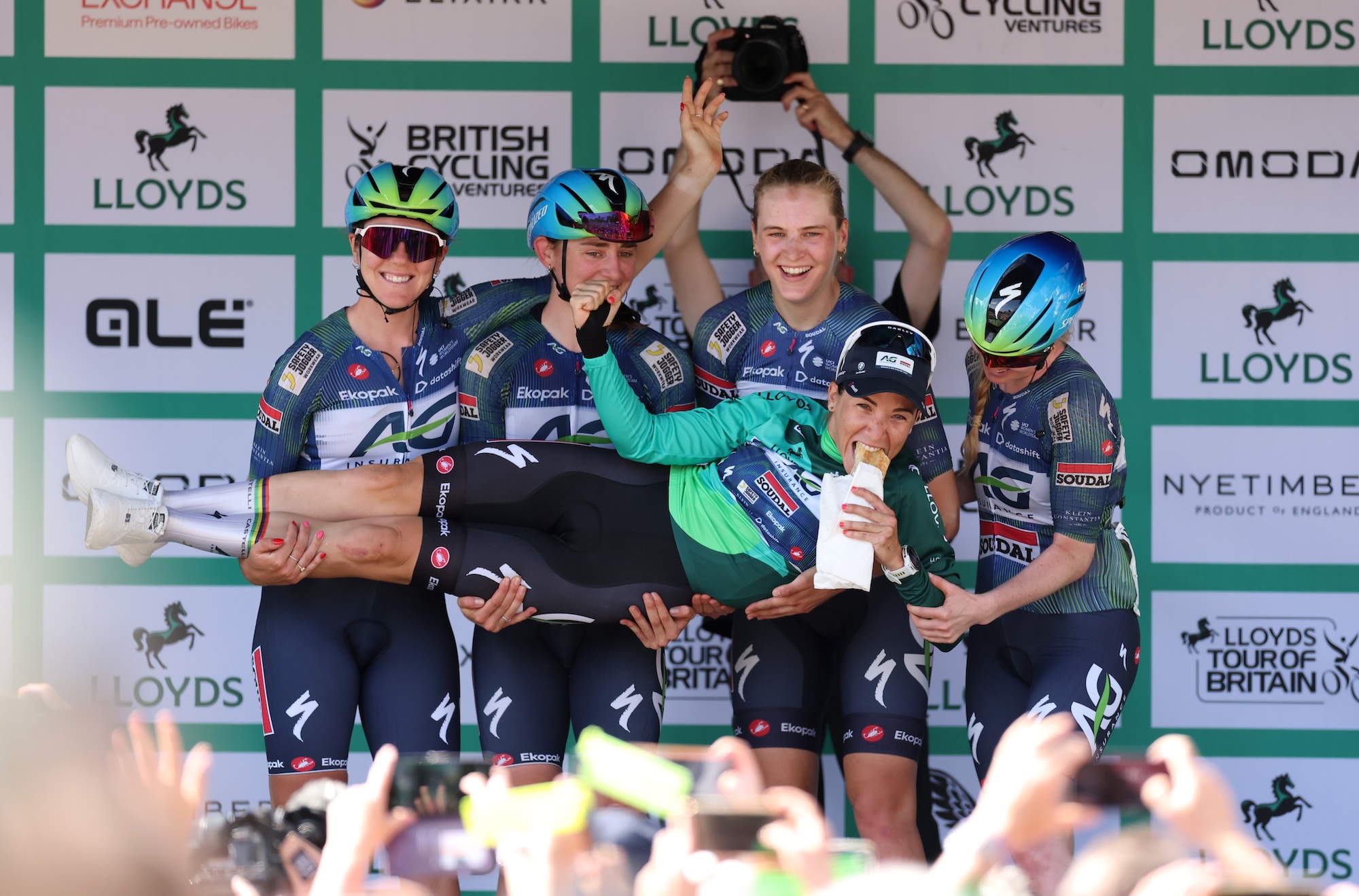 Kim Le Court-Pienaar of Mauritius and Team AG Insurance - Soudal Team celebrates at podium as Green Leader Jersey winner with her team-mates during the 11th Lloyds Tour of Britain Women 2026