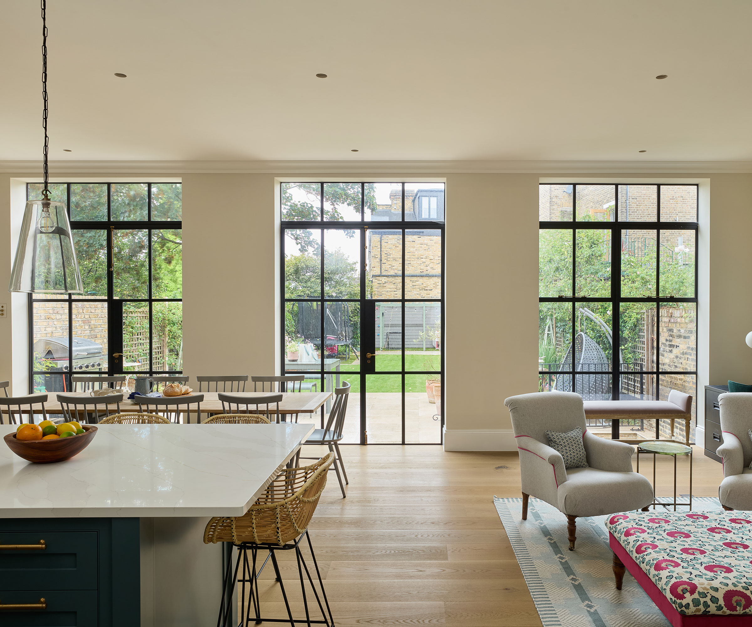 open plan ktichen with seating area and Crittall style doors