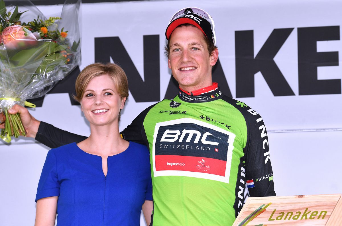 A smiling Stefan Kung (BMC) remains in green