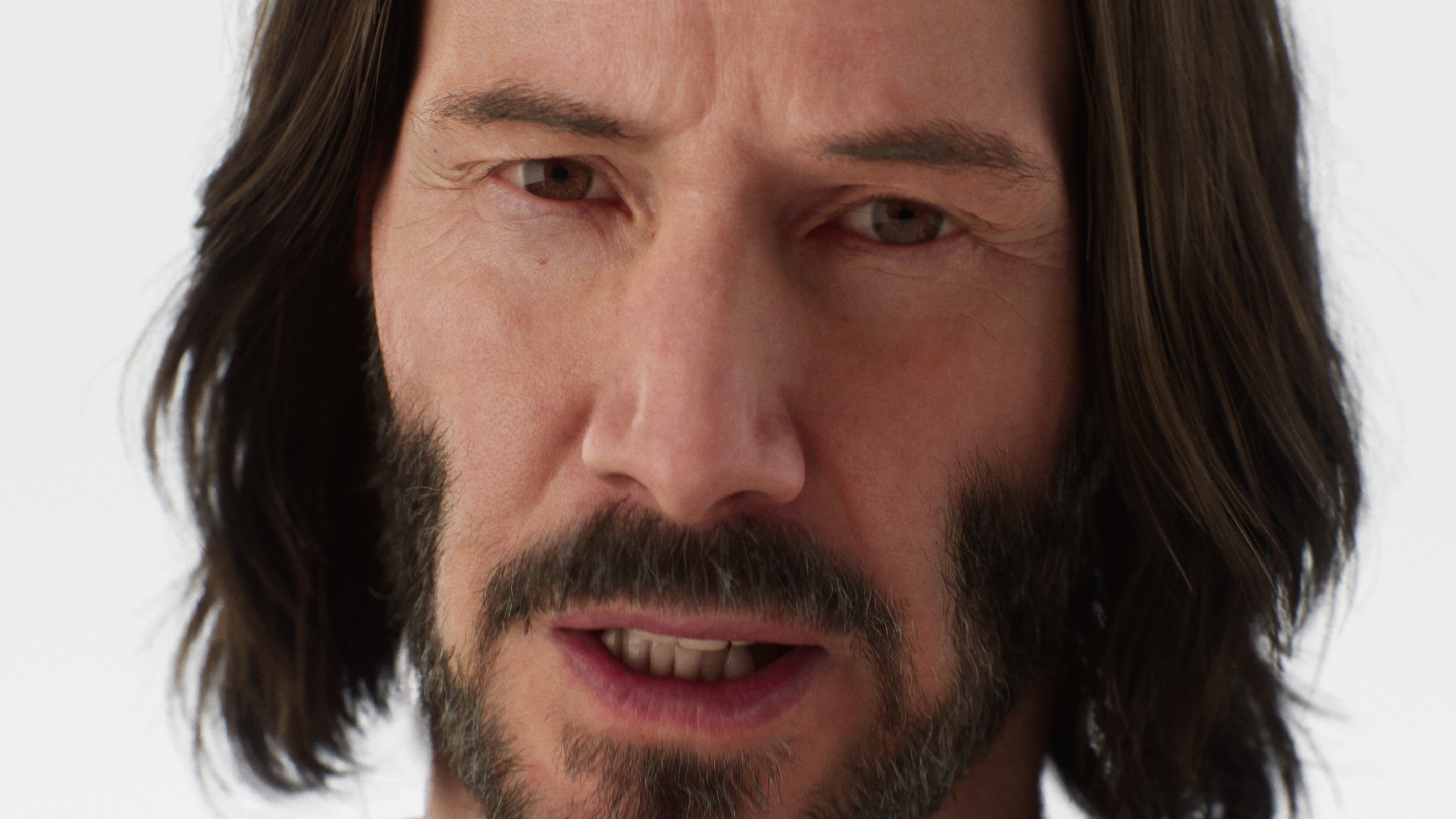 The a close-up of the face of Keanu Reeves.