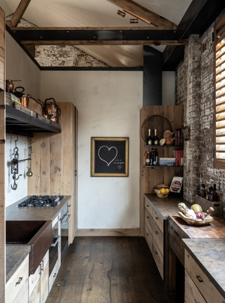 A rustic kitchen with butcher block countertop