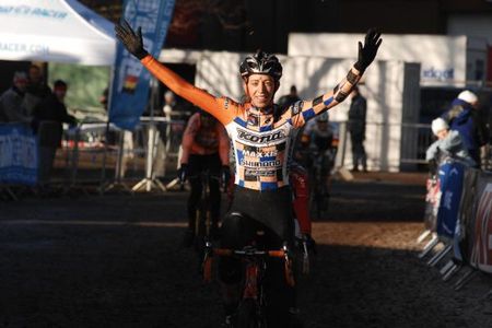 Helen Wyman celebrates her victory in the Brtish cyclo-cross national championships.