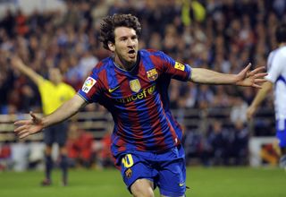 Lionel Messi celebrates one of his goals for Barcelona against Real Zaragoza in March 2010.