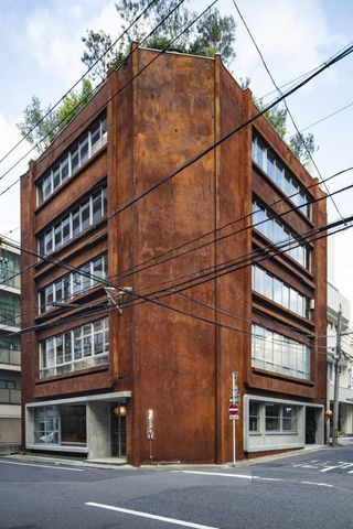 hero exterior of corrugated metal facade of Nekoyacho Bldg by Suppose Design Office