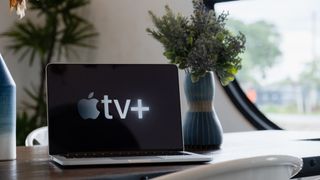 Apple TV Plus logo on a Macbook Pro