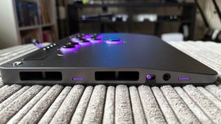 A top-down image of the Victrix Pro KO leverless fight stick from the side