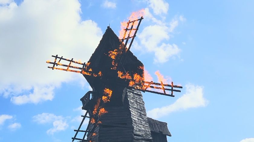 Burning Blade Tavern on fire inside Dark Universe at Epic Universe theme park