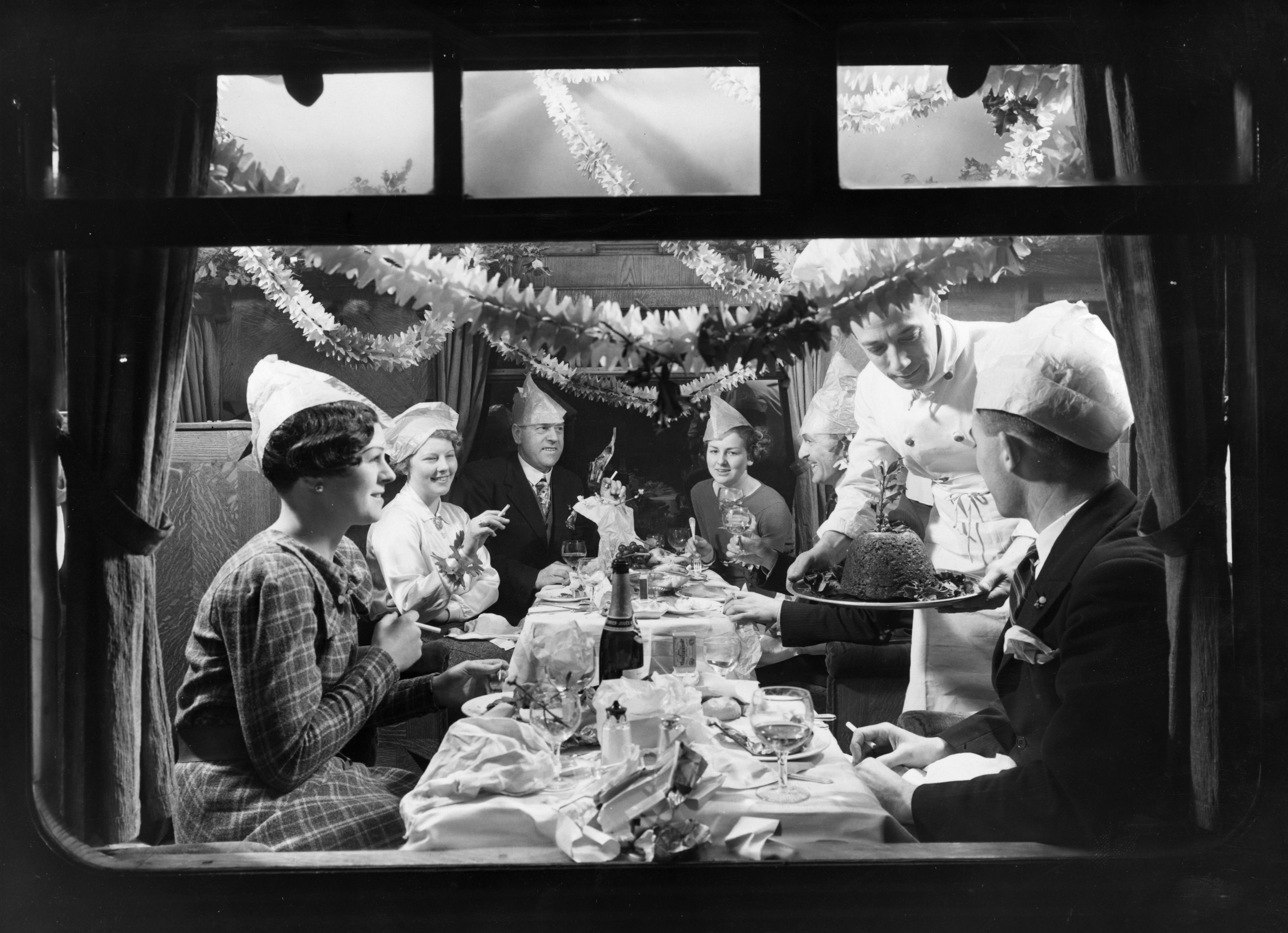 December 1935: A group of people having a Christmas party on the LMS train.
