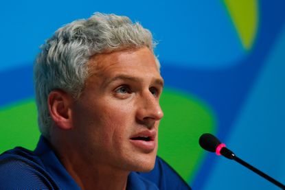 Ryan Lochte speaks at a press conference