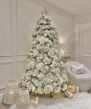 Minimalist, white christmas decor with striking hydrangea christmas tree