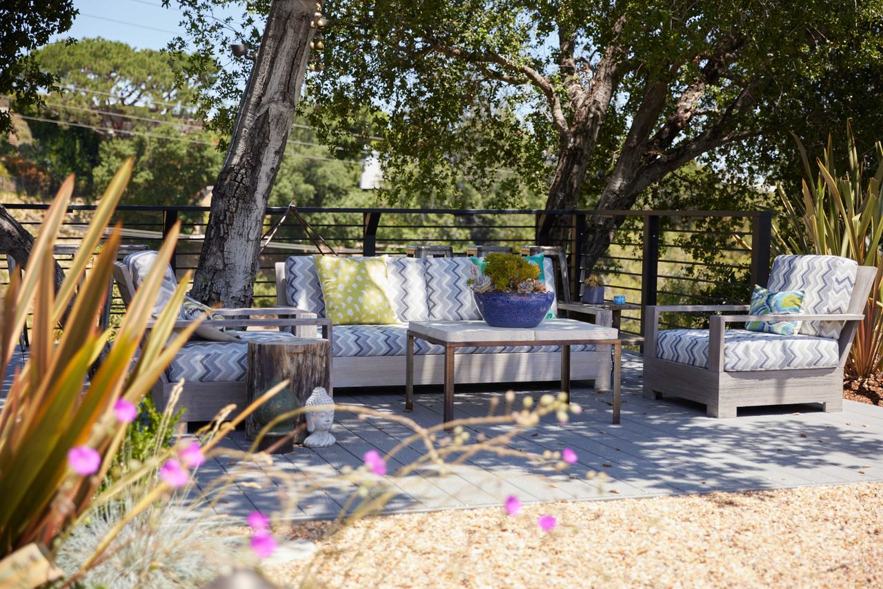 an outdoor sofa in a shady spot
