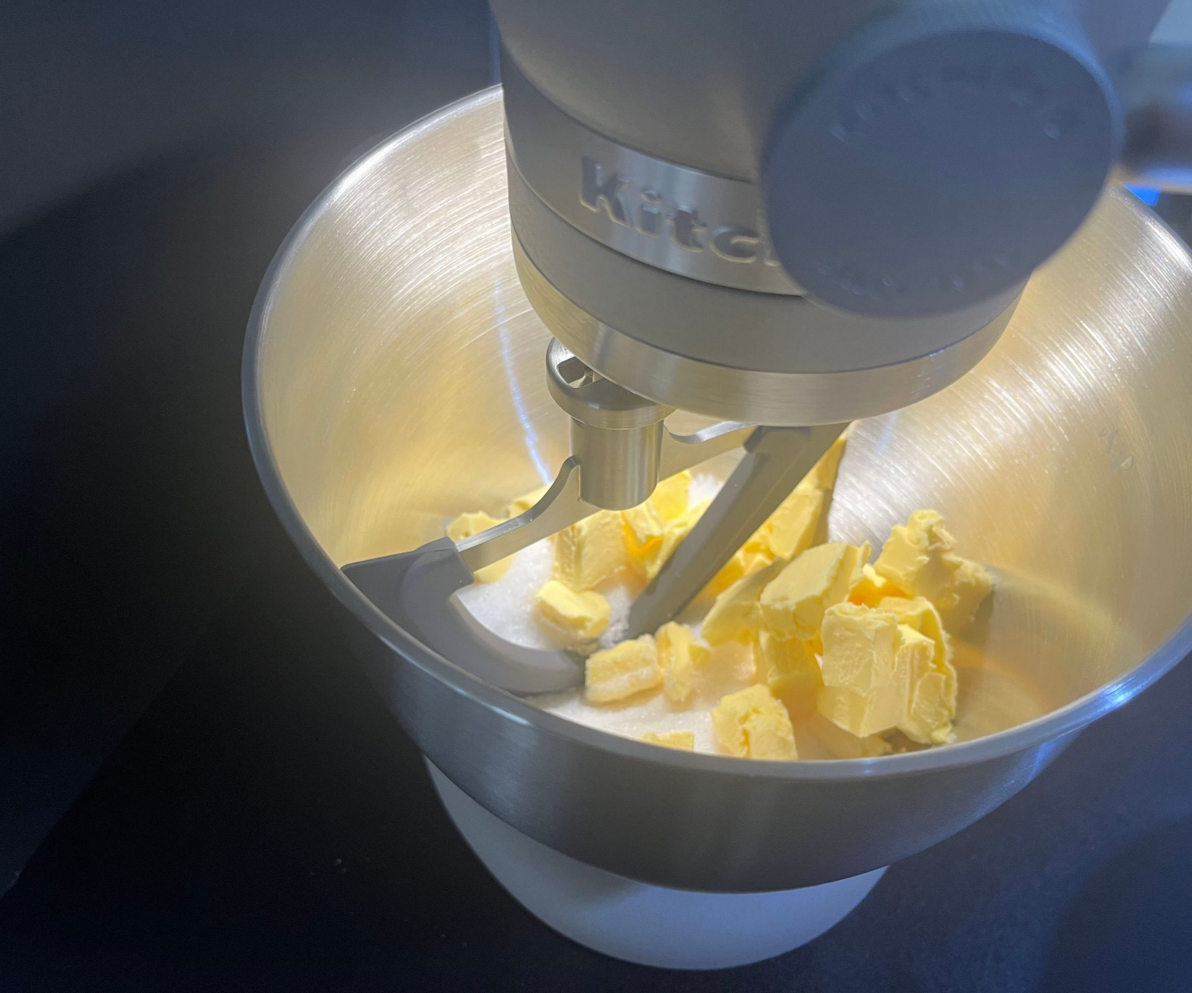 The bowl light illuminating butter and sugar in the KitchenAid Artisan Plus Stand Mixer