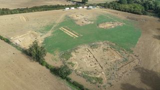 An aerial overview of the villa field showing all of the excavation areas examined in the summer of 2022, with the aisled building in the foreground.