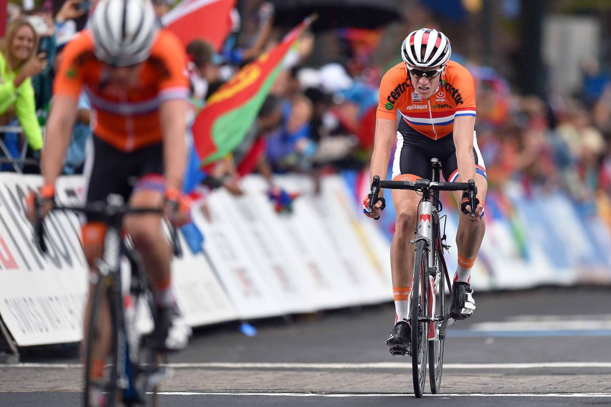 Twan Brusselman (Netherlands) rolls over in 23rd
