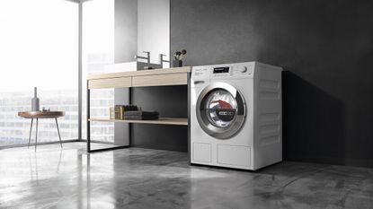 The best washer dryer 2022, image shows a modern-style bathroom with washer dryer in it