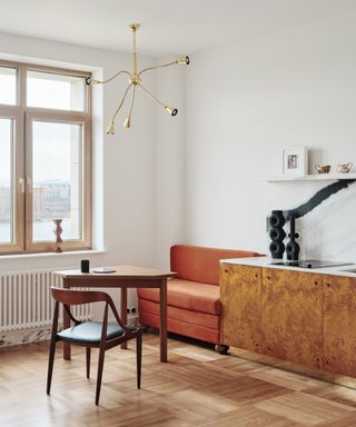 a small banquette seat in a small apartment