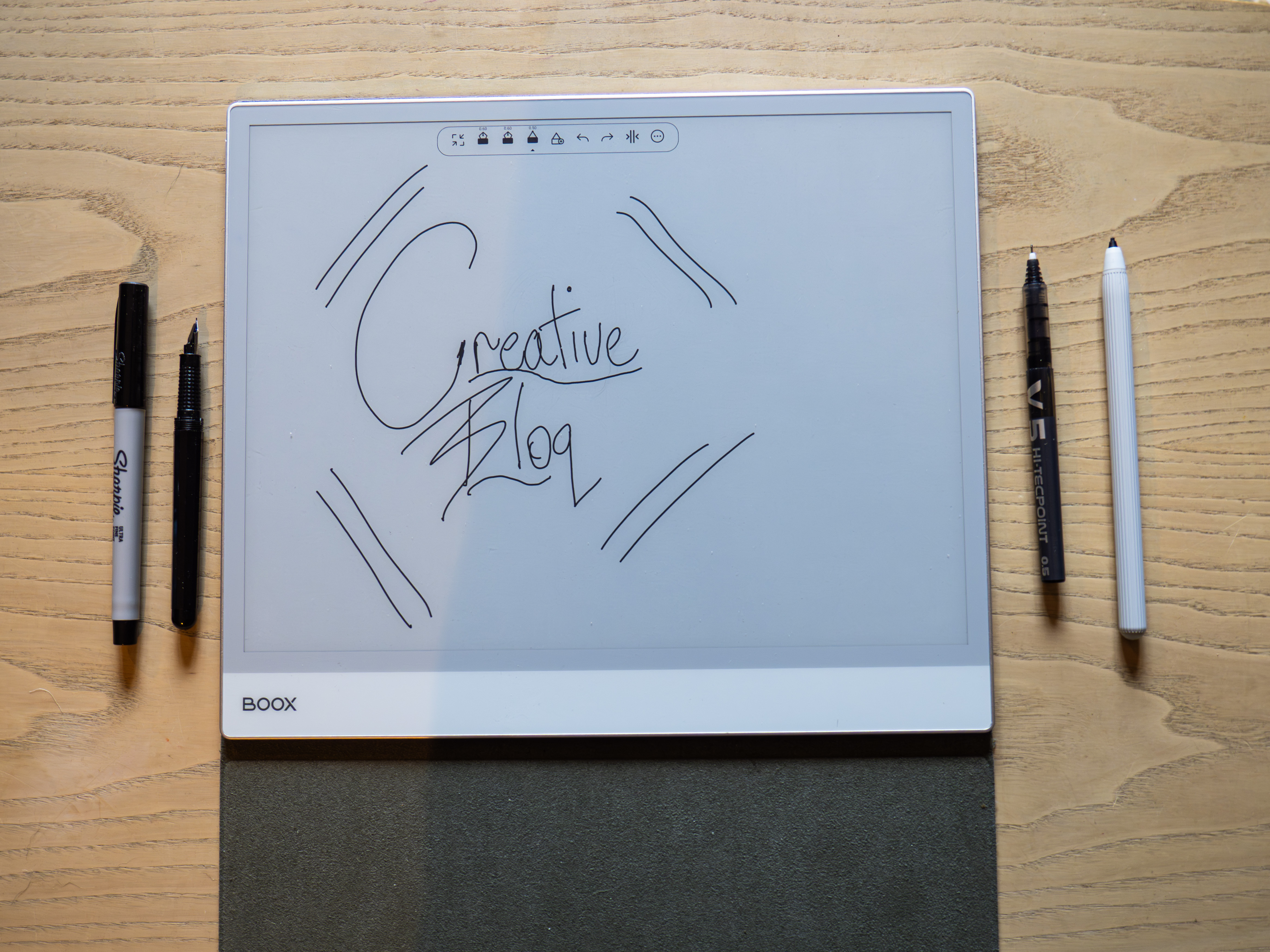 An Onyx Boox Note Max ereader on a desk