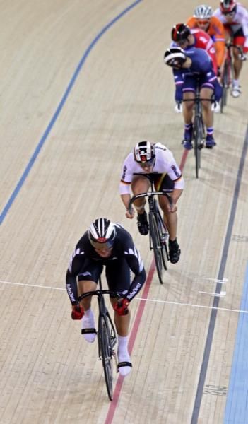 Kiwi Simon Van Velthooven takes advantage of the gap that opened in the Keirin final but can&sup1;t hold on to take a medal